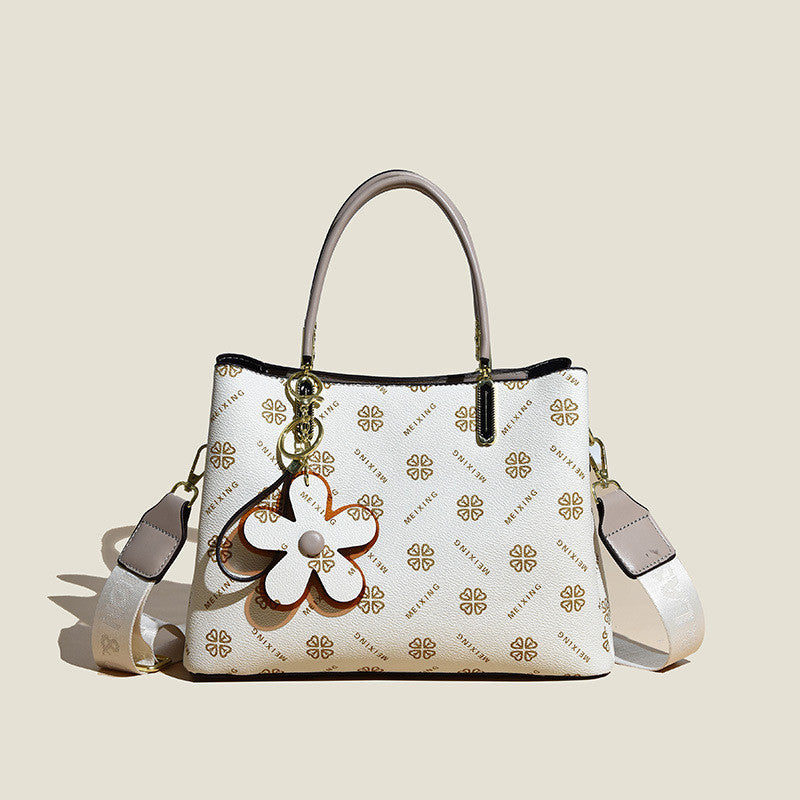 Printed Hand Bag With Flower Pendant