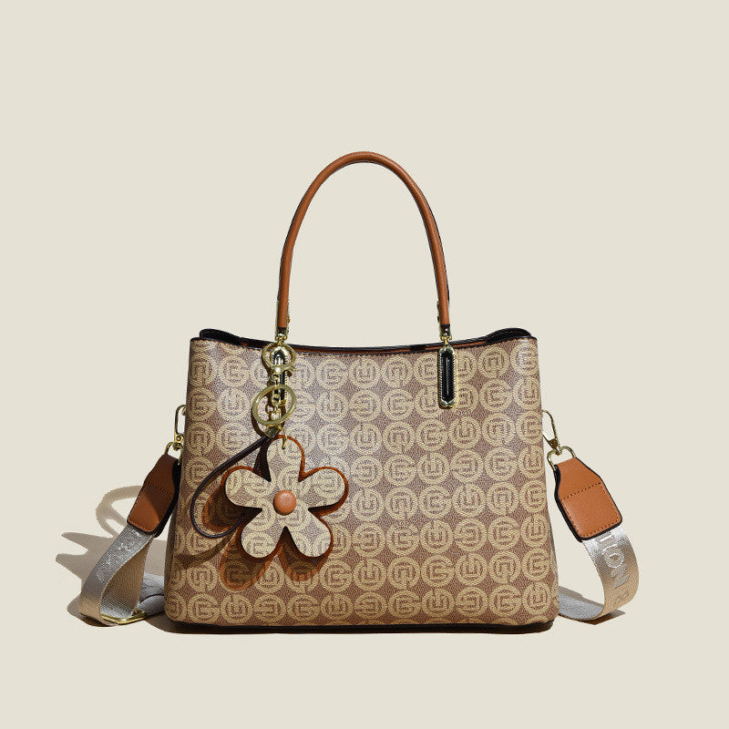 Printed Hand Bag With Flower Pendant